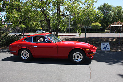 red 240z checking out